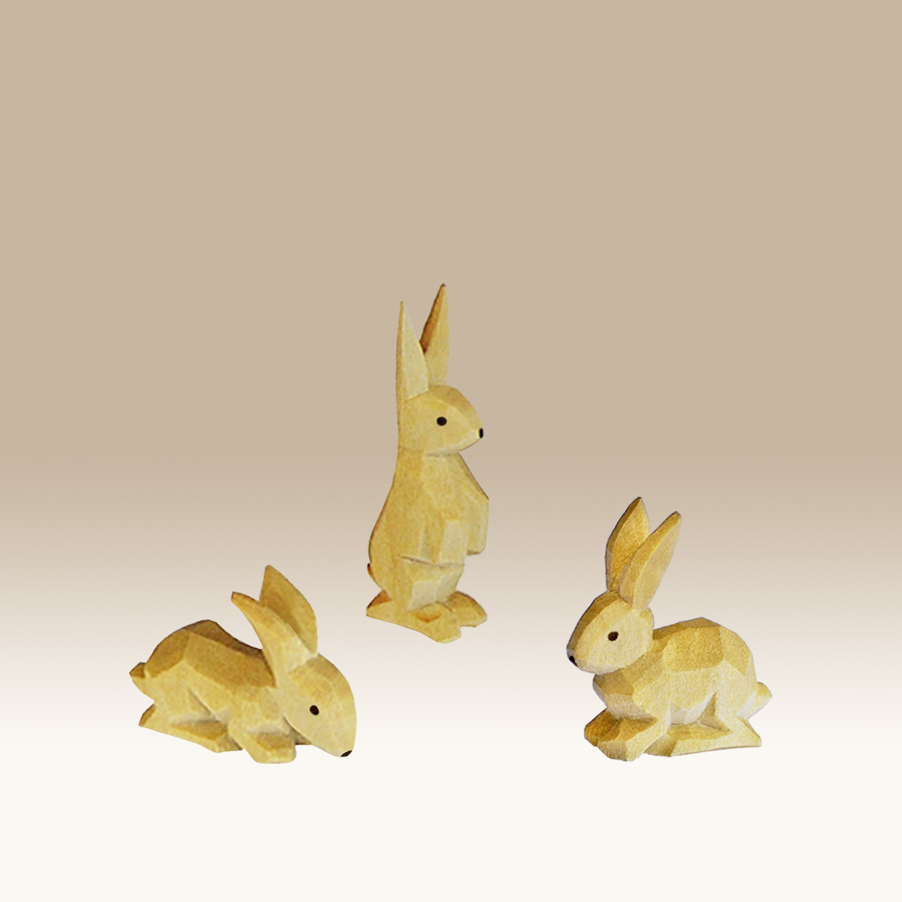 Geschnitzte Hasengruppe