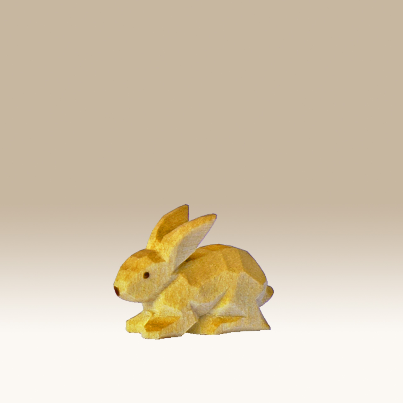 Geschnitzter Hase, liegend