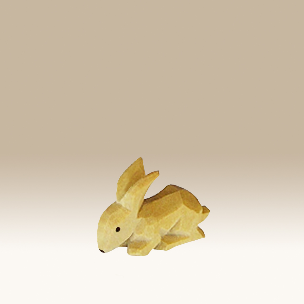 Geschnitzter Hase, äsend